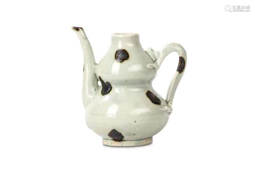A CHINESE QINGBAI DOUBLE GOURD EWER. Ming Dynasty. The body formed in two sections set with a