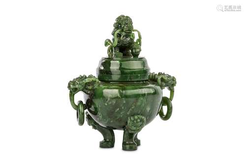 A CHIENSE SPINACH JADE TRIPOD CENSER WITH COVER. Late Qing Dynasty. The globular body supported on