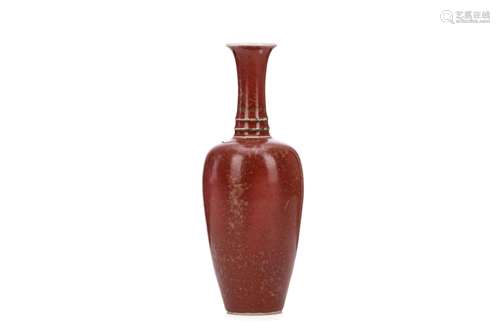 A CHINESE PEACH-BLOOM GLAZED VASE. Qing Dynasty, Kangxi mark and of the period. With a slender