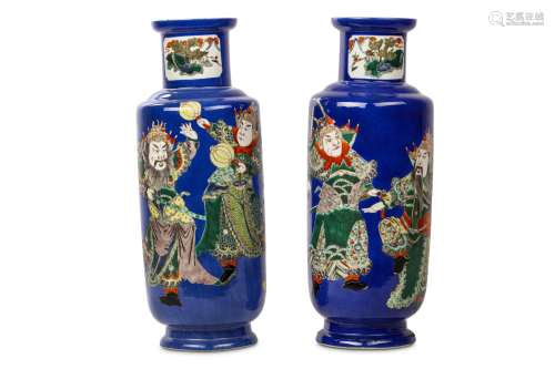 A PAIR OF CHINESE FAMILLE VERTE DECORATED POWDER BLUE VASES. Qing Dynasty. Of rouleau-form, painted