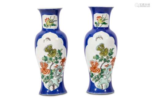 A PAIR OF CHINESE POWDER BLUE VASES. Qing Dynasty, 19th Century. Decorated with panels of peonies