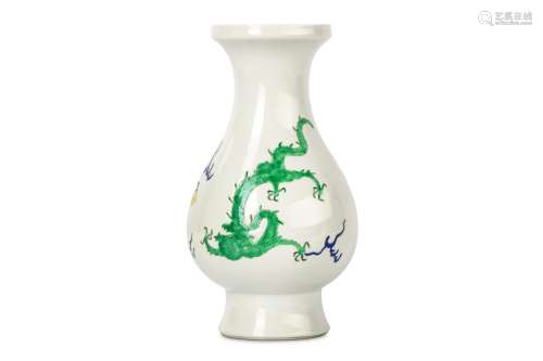 A CHINESE WHITE GLAZED VASE ‘DRAGON’ VASE. 19th / 20th Century. Incised and colourfully glazed with