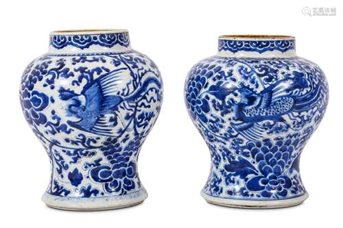 A PAIR OF CHINESE BLUE AND WHITE 'PHOENIX' VASES. Qing Dynasty, 18th Century. Of baluster form,