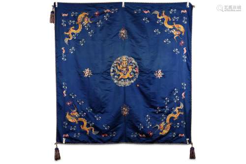 A CHINESE BLUE GROUND EMBROIDERED SILK 'DRAGON' HANGING. Late Qing Dynasty. Embroidered to depict a