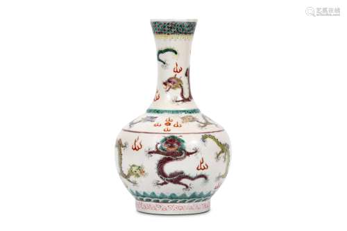A CHINESE WHITE GROUND SGRAFFITO ‘DRAGON’ VASE. 19th / 20th Century. Decorated with coiled dragons
