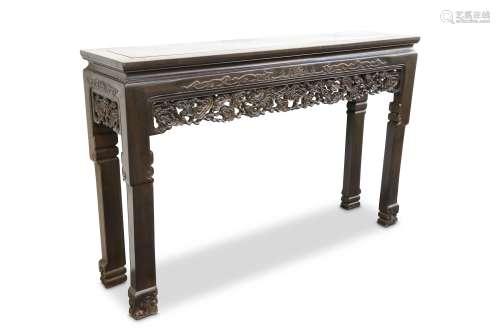 A LARGE CHINESE JICHIMU ALTAR TABLE. Qing Dynasty. The rectangular top set within a frame with '