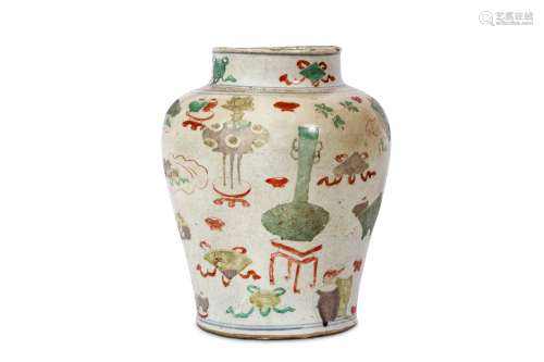 A CHINESE SANCAI ‘TREASURES’ VASE. Transitional era. Of baluster form, decorated to the exterior