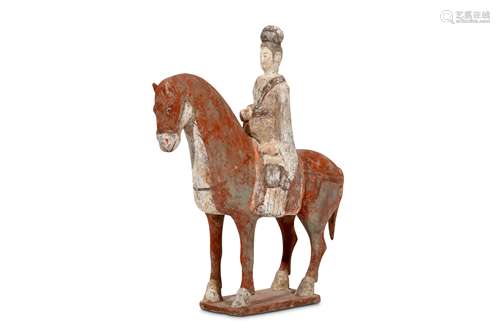 A CHINESE PAINTED POTTERY HORSE AND LADY RIDER. Northern Wei Dynasty. 24 x 29cm. (2) 北魏