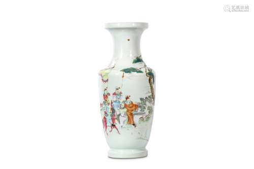 A CHINESE FAMILLE ROSE FIGURATIVE VASE. Qing Dynasty. Of baluster form with a trumpet neck, finely