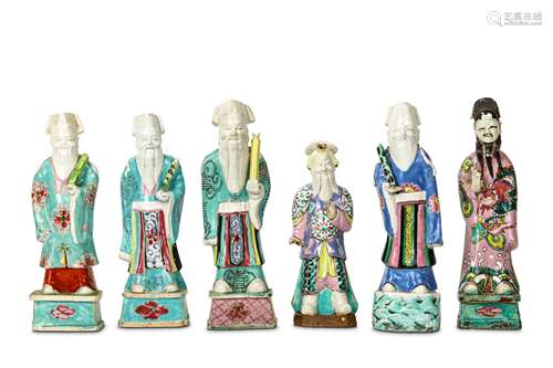 A COLLECTION OF SIX CHINESE FAMILLE ROSE IMMORTALS. Qing Dynasty, 19th Century. Each figure