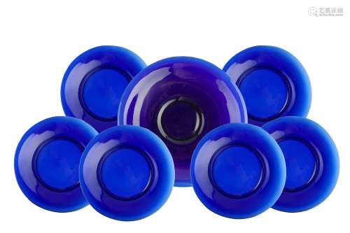 A CHINESE COLLECTION OF SEVEN BLUE PEKING GLASS DISHES. 19th / 20th Century. 19.5/30cm diameter.  (