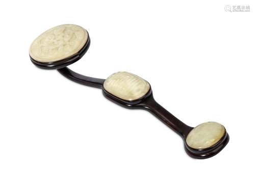 A CHINESE JADE-INSET WOOD RUYI SCEPTRE. Qing Dynasty, 19th Century. Inset with three jade panels,