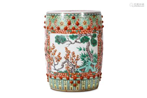 A CHINESE FAMILLE ROSE DRUM STOOL. 20th Century. Decorated with rectangular panels of peonies with
