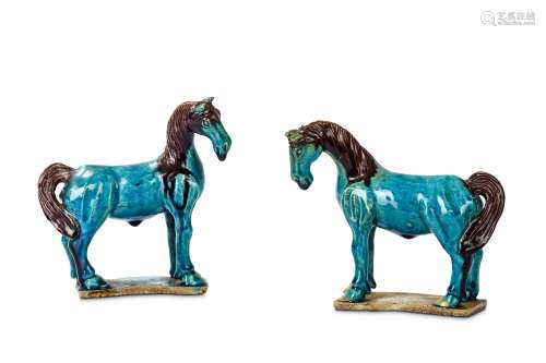 A PAIR OF CHINESE TURQUOISE AND AUBERGINE GLAZED HORSES. Qing Dynasty, 19th Century. Each standing