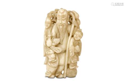 A CHINESE JADE ‘SHOULAO AND BOYS’ CARVING. Qing Dynasty. 19th Century. The bearded figure standing