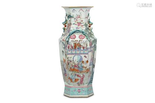 A CHINESE FAMILLE ROSE HEXAGONAL VASE. Qing Dynasty, 19th Century. Of baluster form, the shoulders