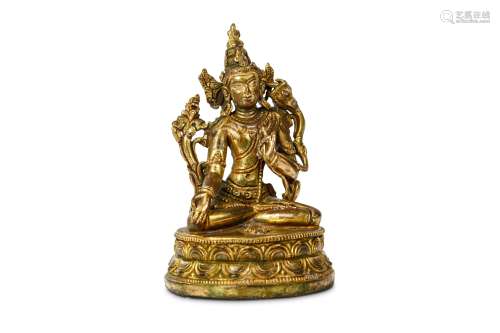 A CHINESE GILT BRONZE FIGURE OF WHITE TARA. Cast seated in dhyanasana on a double lotus base, the