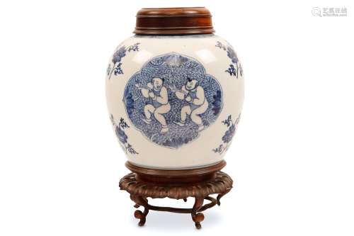 A CHINESE BLUE AND WHITE ‘BOYS’ JAR. Qing Dynasty, Kangxi era. Decorated with quatrefoil panels