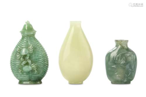 THREE CHINESE HARDSTONE SNUFF BOTTLES. 19th / 20th Century. One of pear shaped form modelled as a
