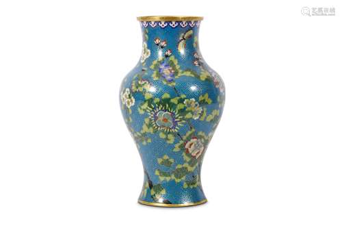 A CHINESE CLOISONNÉ ENAMEL VASE. Qing Dynasty. Of baluster form decorated with flowering prunus