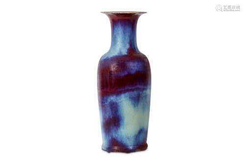 A CHINESE LARGE FLAMBÉ GLAZED VASE. Qing Dynasty. Of elongated baluster form, with a trumpet neck,
