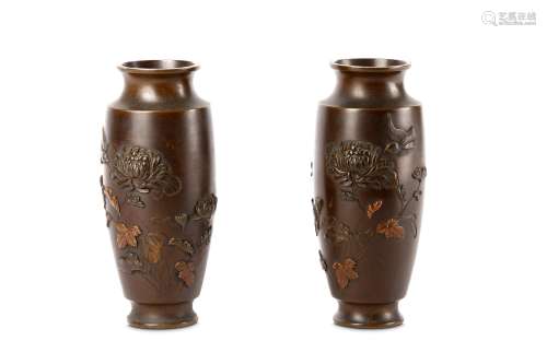 A PAIR OF JAPANESE BRONZE VASES. Meiji period. Chiselled and inlaid with chrysanthemums and flying