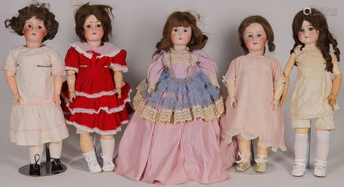 FIVE GERMAN BISQUE HEAD DOLLS