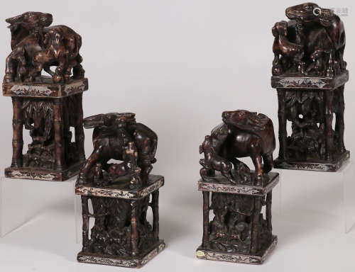 FOUR CHINESE CARVED HARDSTONE FIGURAL SEALS