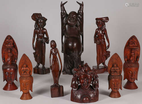 NINE ASIAN CARVED WOOD FIGURES