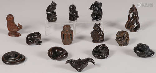 TEN CARVED HARDWOOD NETSUKES, 20TH CENTURY