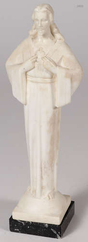 AN ART DECO CARVED ALABASTER FIGURE OF CHRIST