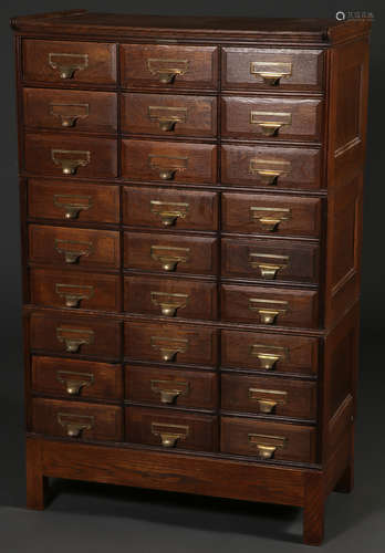 A FINE OAK CARD CATALOG FILE CABINET