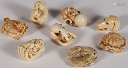 EIGHT CARVED IVORY NETSUKES