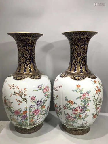 A PAIR OF FLOWER PATTERN FAMILLE ROSE VASES