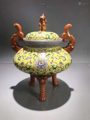 A FLORAL PATTERN YELLOW GLAZED THREE-FOOT CENSER