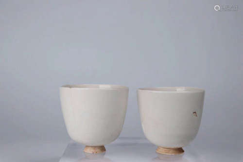 10-12TH CENTURY, A PAIR OF DING KILN WHITE GLAZED CUPS, SONG DYNASTY