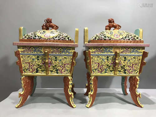 A PAIR OF FLORAL PATTERN ENAMEL FURNACE