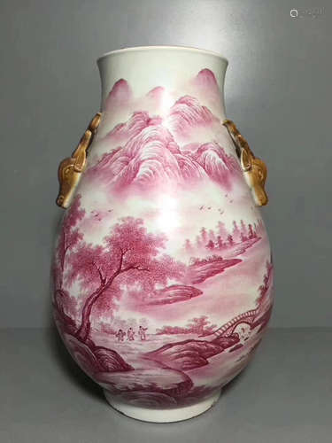 A LANDSCAPE PATTERN DOUBLE-EAR CARMINE RED GLAZED VESSEL