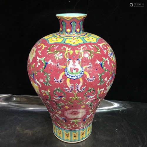 A FLORAL PATTERN FOREIGN COLOUR PLUM VASE