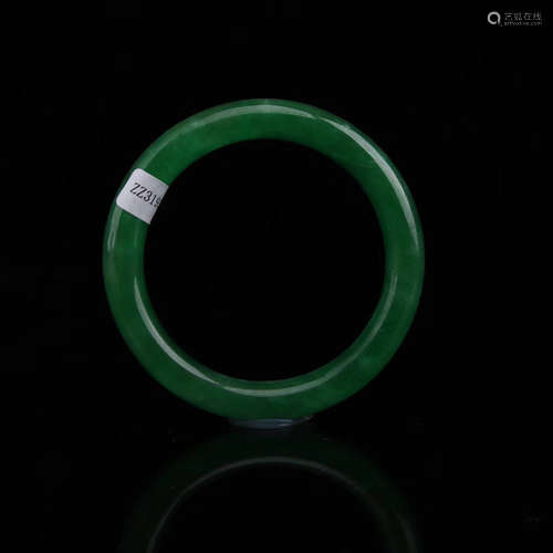 AN OLD JADEITE BANGLE