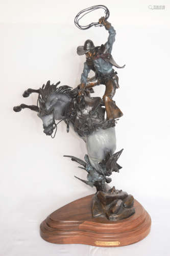 A Bronze Cowboy Sculpture 