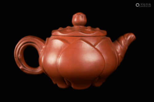 A Chinese Yixing Clay Teapot with Lotus Flower Design, marked 