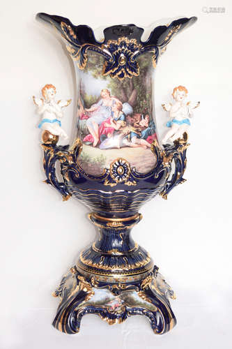 A 80cm Large Continental Indigo Ground Trophy Shape Vase with Two Angels