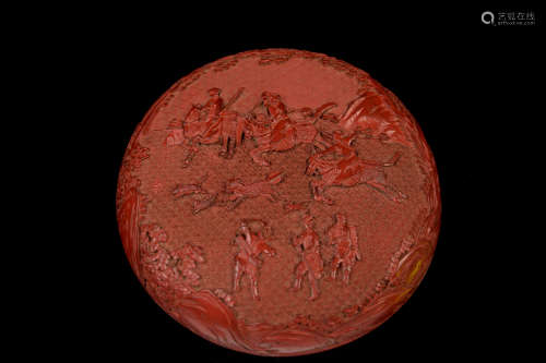 [Chinese] A Cinnabar Lacquered Round Wood Box Carved with Portrait of Royal Hunting
