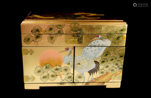 A Black Lacquered Jewelry Box with Gold Leaf and Painted with Cranes and Pines