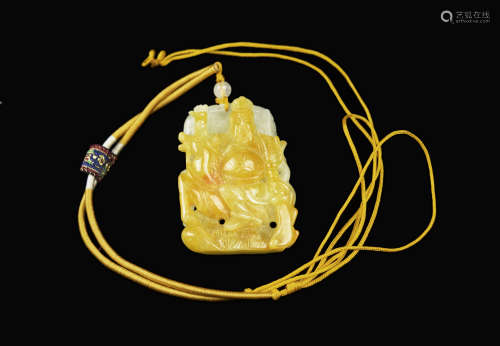 A Yellow and White Jadeite Pendant Carved with Guangong