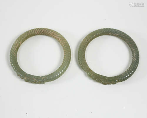 PAIR OF DRAGON SHAPED BANGLES