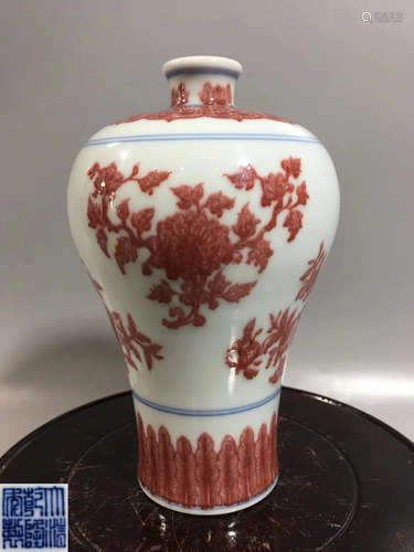 A UNDERGLAZED RED MEI VASE WITH QIANLONG MARK