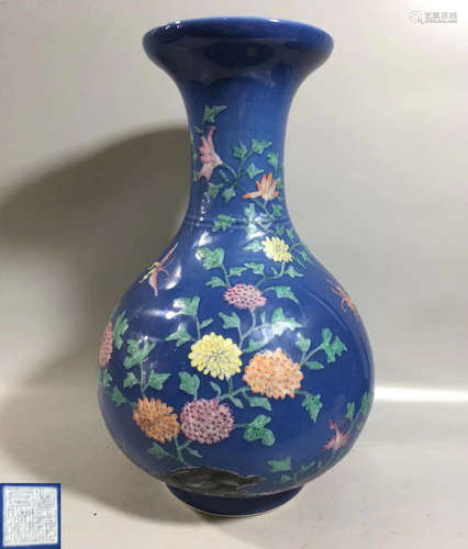 A BLUE GLAZED BLOSSOMS PATTERN BOTTLE VASE