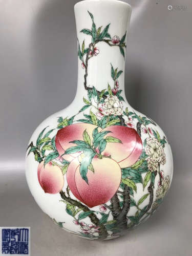 A QIANLONG MARK FAMILLE-ROSE VASE